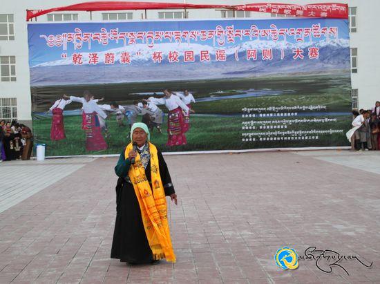 མཁྱེན་བརྩེ་འོད་སྣང་བུམ་པ་རྟགས་ཅན་གྱི་སློབ་རའི་ཨ་རྩེད་འགྲན་ཚོགས།